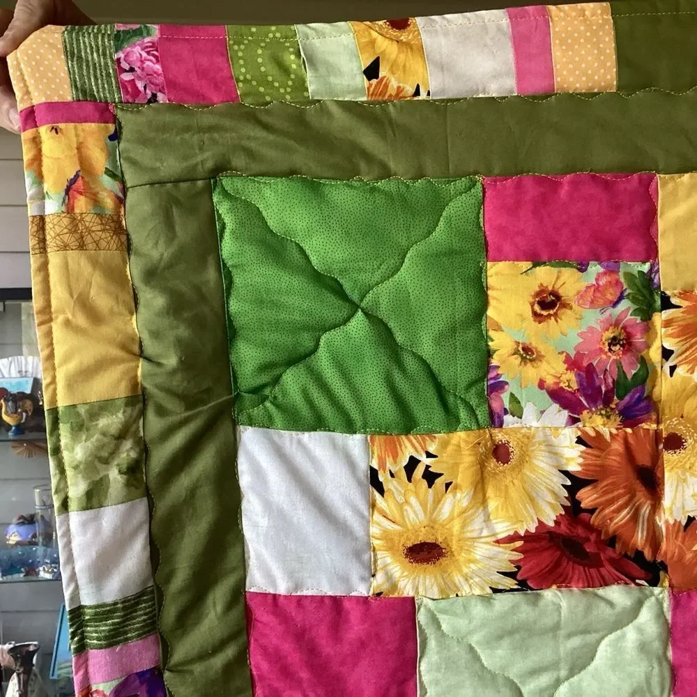 NWT. Hand Crafted Field of Flowers  Quilt with Green, Yellow and Pink Accents